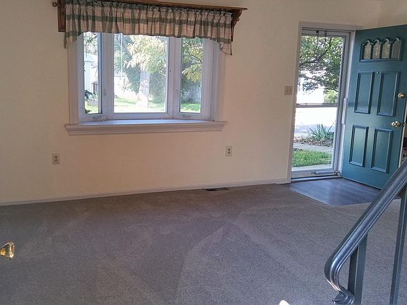 Side Door view of Living room.