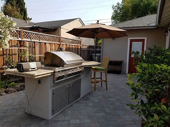 Grill up some delicious steaks and dine outdoors at the bar-top table!