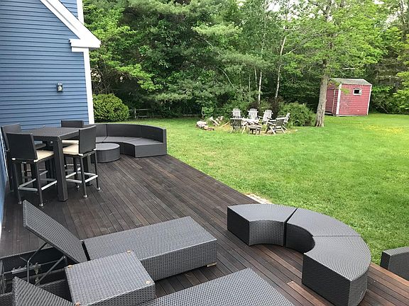 view of firepit from ample deck area