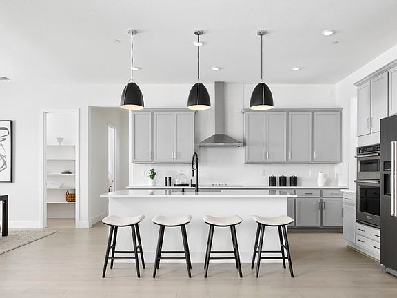 Open kitchen with decorative lighting