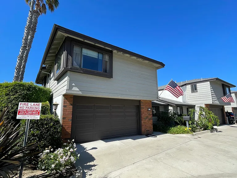 Two car garage with direct access to home and patio