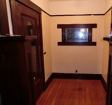 Entry hall with mirror and coat hooks