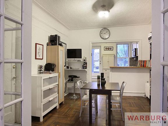 3rd image of 102 E 4th St APT 3
