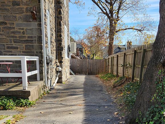Parking Spot and walkway to back door and yard
