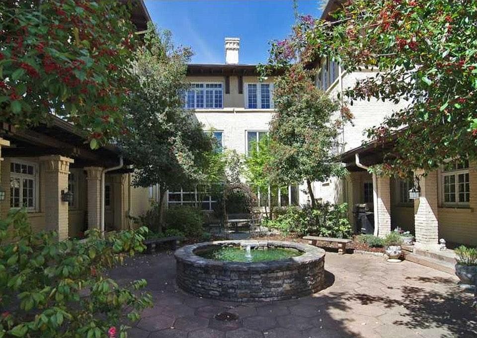 Gated coutyard with available grill