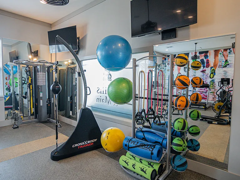Enjoy the expansive fitness center at Millis and Main at Grandover in Jamestown, NC