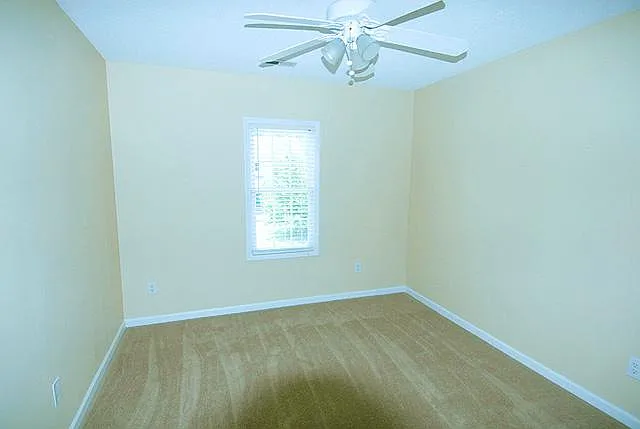 Guest Bedroom 1 - all bedrooms have ceiling fans with wall switch controls.