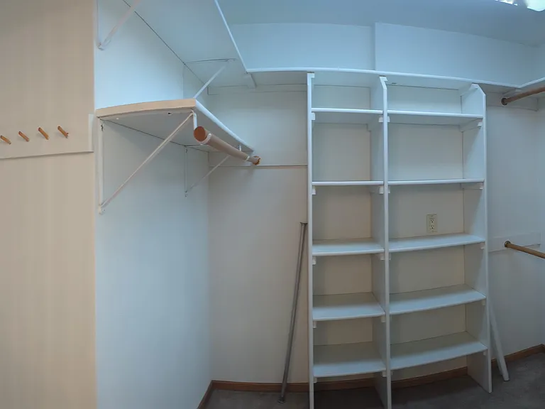 Master bath walk-in closet. Wide-view.