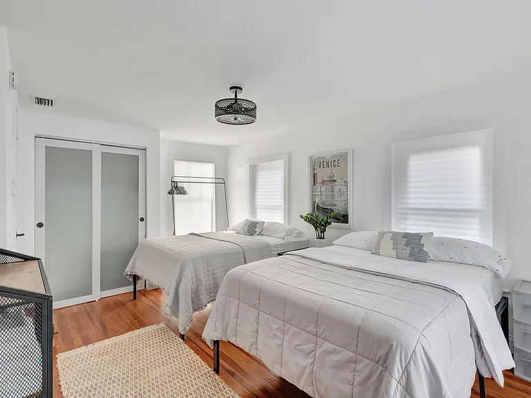 Bedroom 2. Two full-size beds.