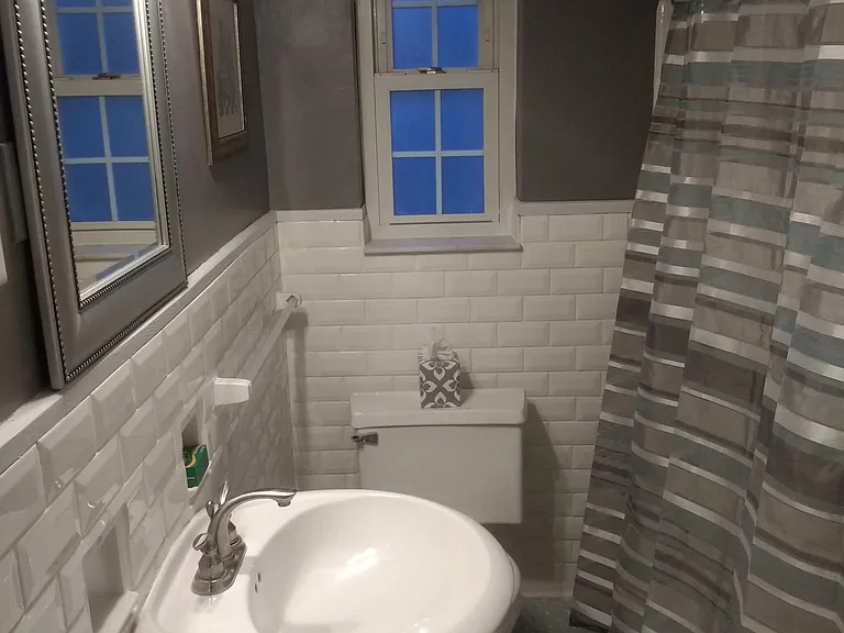 Renovated bathroom. Toilet has been upgraded.