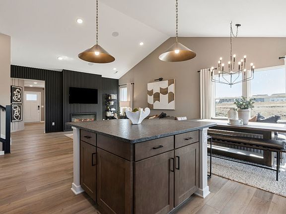 Open-concept design blending kitchen, dining, and living areas effortlessly.