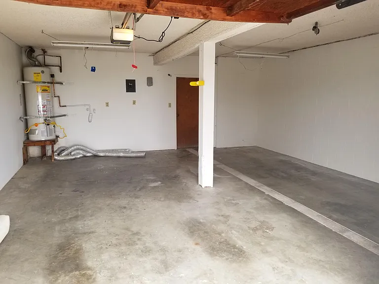 2 car garage. Laundry hookups.