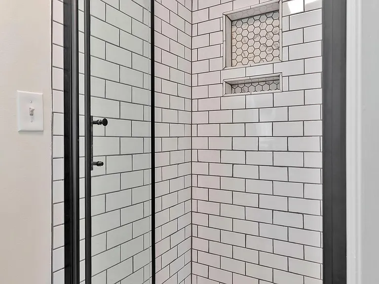 Tiled shower in master bathroom
