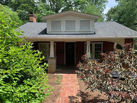 charming craftsman with large front porch and porch swing