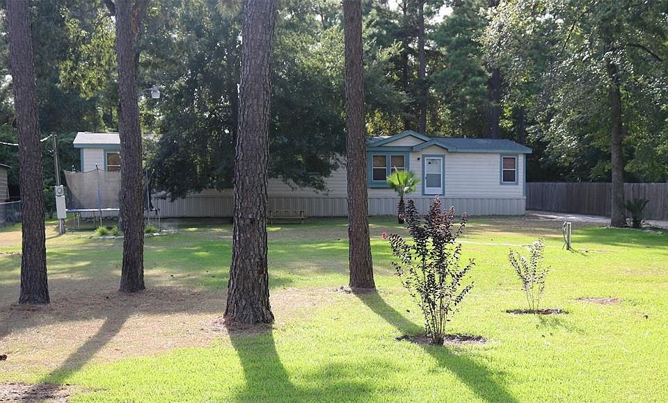 Set back from road on 1/2 acre!