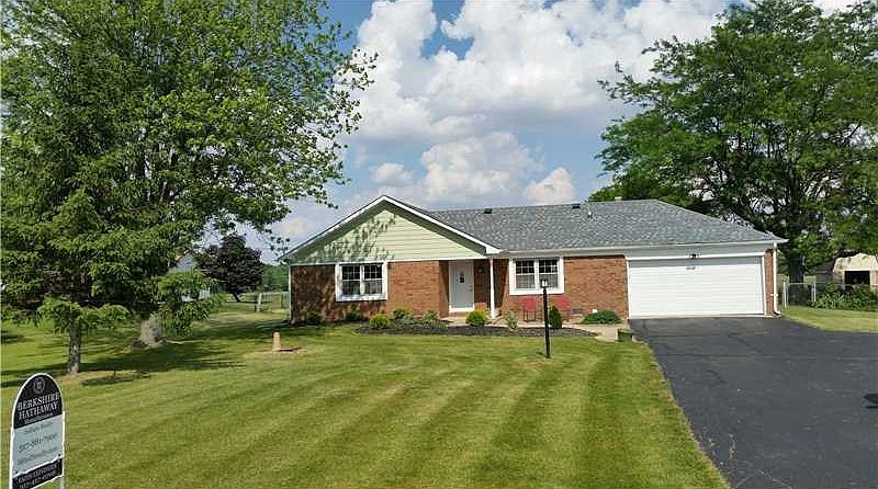 Exterior Front. Awesome curb appeal on this completely remodeled brick ranch!