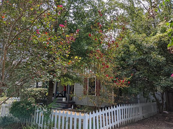 Richly shaded front yard.