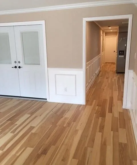 living room facing the kitchen hallway and bedroom