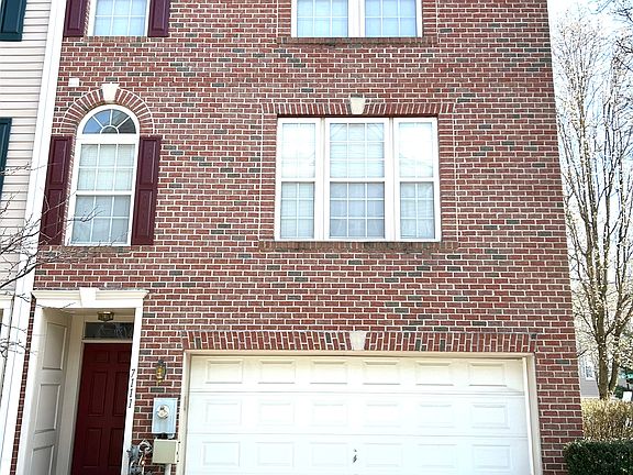 Front with 2-car garage