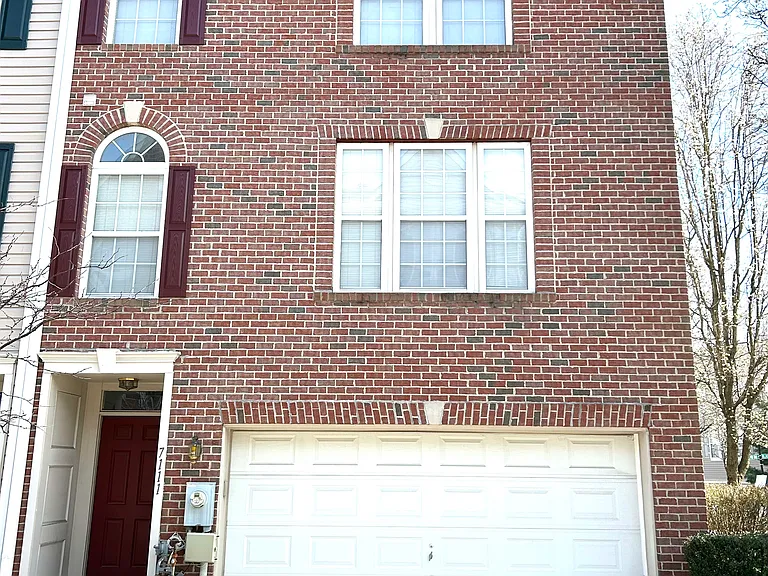Front with 2-car garage