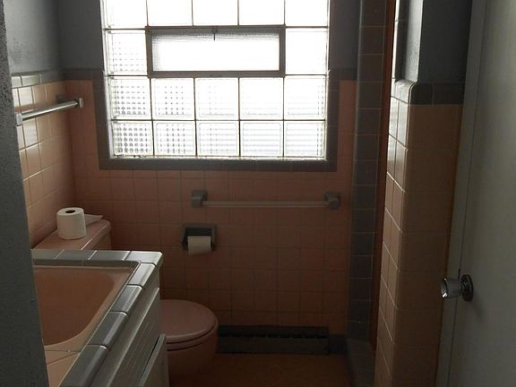 Bathroom with shower & linen closet