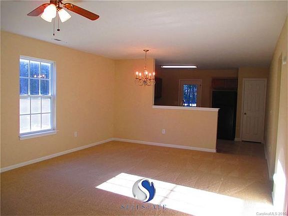 Great room opens to dining room and kitchen