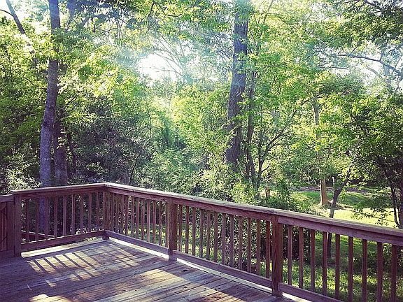 Back deck overlooking trees.