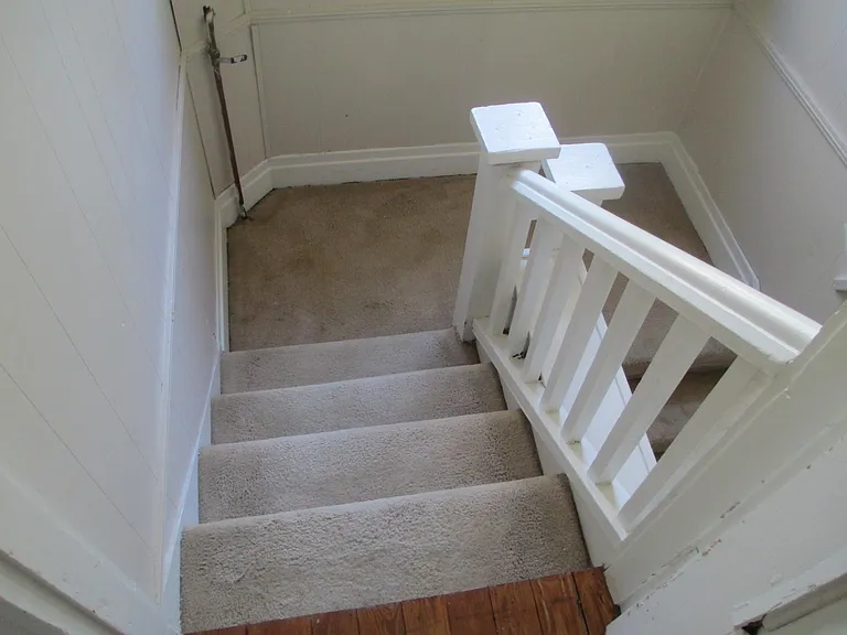 Looking as you leave the apartment