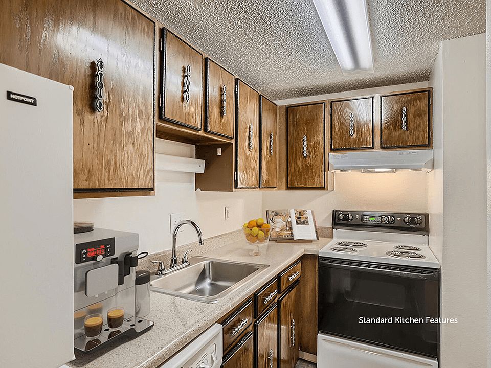 Granite-Inspired Countertops and Bespoke Cabinetry