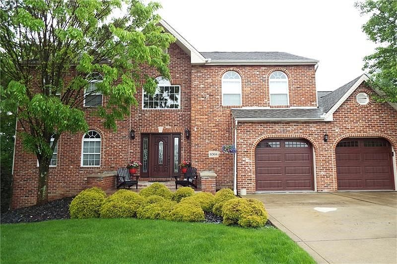 WONDERFUL CURB APPEAL IN A GREAT NEIGHBORHOOD THIS 4 BEDROOM HOME FEATURES NEWER ENTRY DOOR AND GARAGE DOORS.