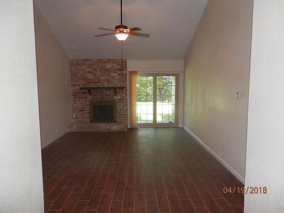 Spacious Living Room with Fireplace easy access to back yard