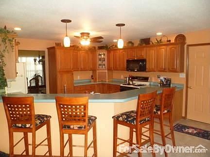 2 story great room view from loft area
						:
						open and spacious great room