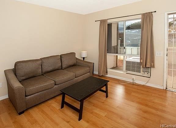 Front door and living room window.