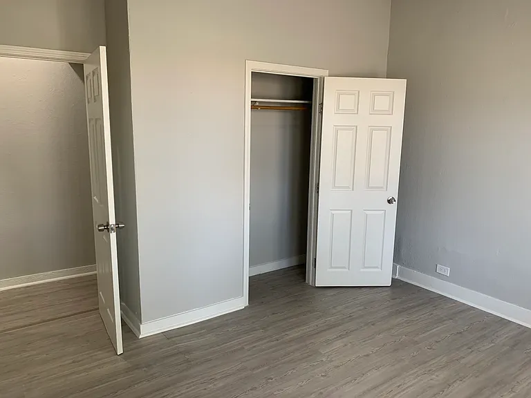 Bedroom with closet and AC