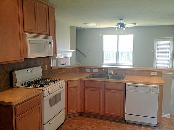 Breakfast bar in the kitchen helps get you rise and shine in the morning.