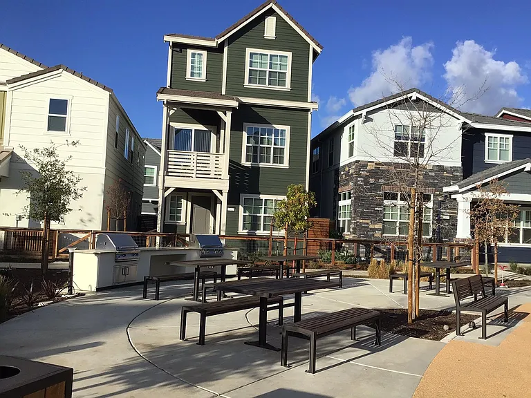 BBQs and seating at central park area