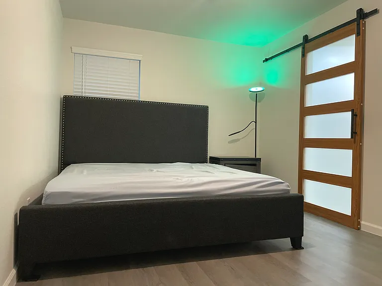 Master bedroom with California king bed
