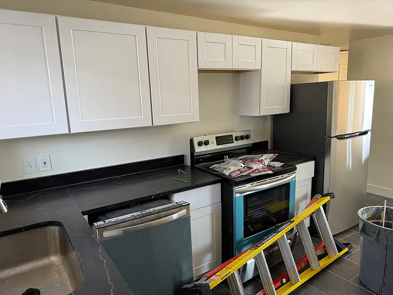 all kitchen counter tops and appliances are new as of 2024