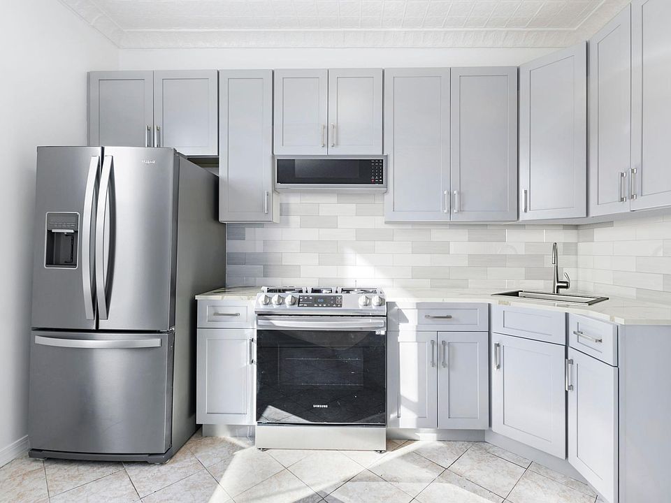 Quartz Counters, backsplash and microwave were rendered since they had not come in. They will be installed by 01/13/2023