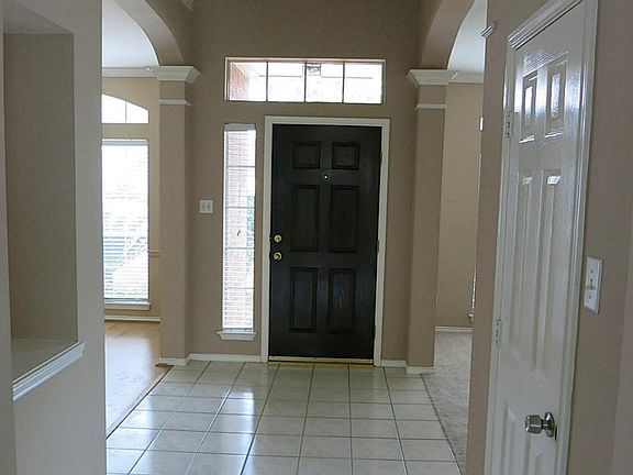 Impressive Two story Entry with tile floors