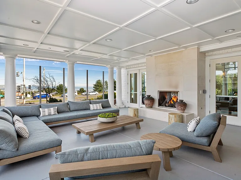 Sitting by the fire place lounge provides the perfect mood for those breezy summer nights