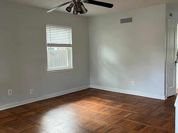 Living room when you walk in, steps are to the right up to the second floor, dining room is located as you walk through