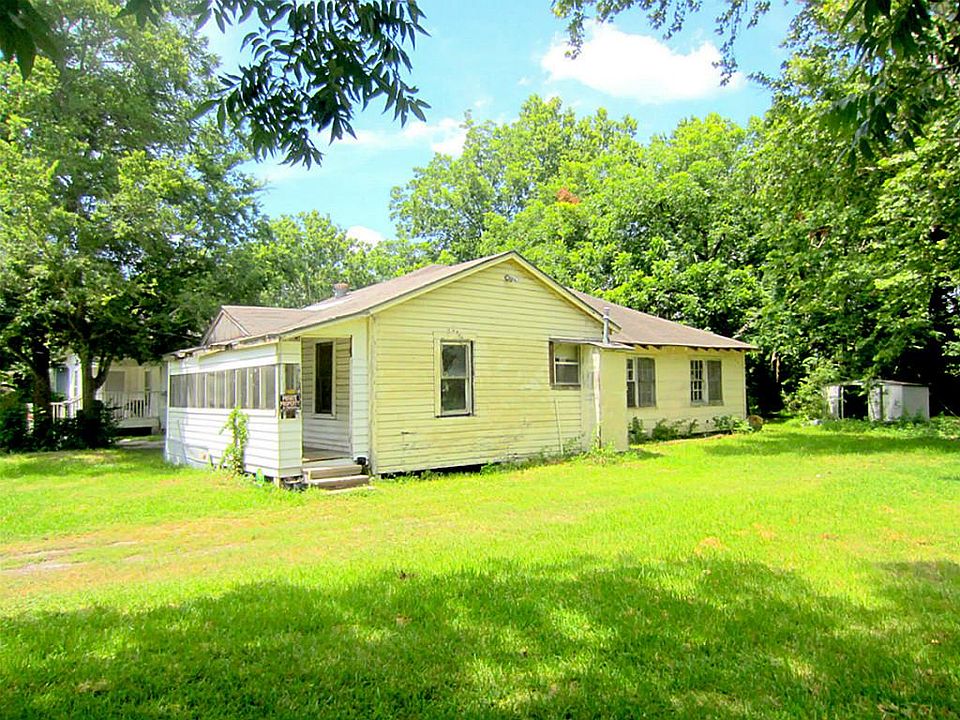 1 house + 2 lots. Selling for Lot Value ONLY