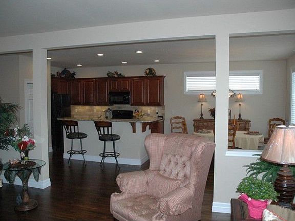 Next to the family room is a wonderful kitchen with a large eating area. Since the kitchen is where 