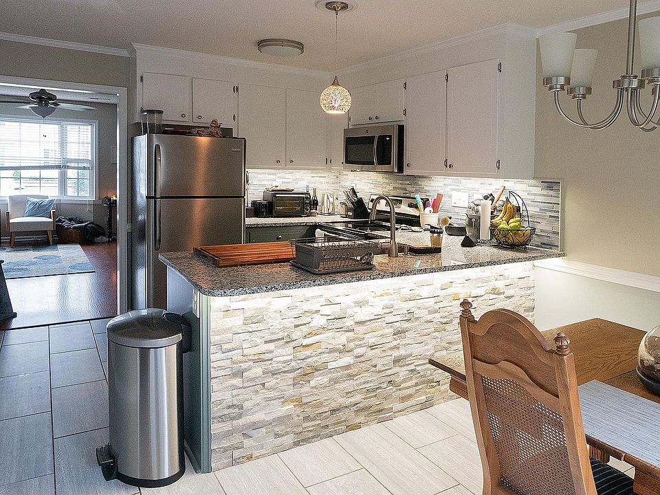 Recently renovated townhome with smart home features, custom tile work throughout