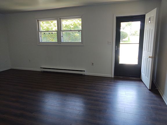 Living room with updated flooring.