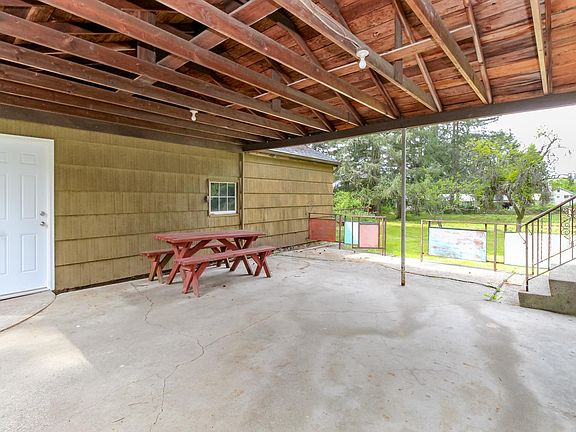 Covered patio between garage and home