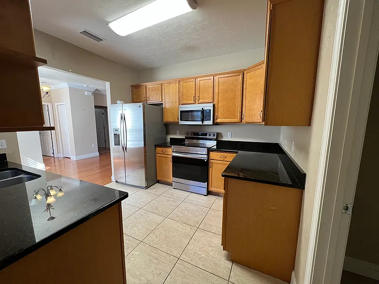 Kitchen view from garage door entrance