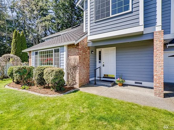 Home features a Presidential Roof and Leaf Guard gutters