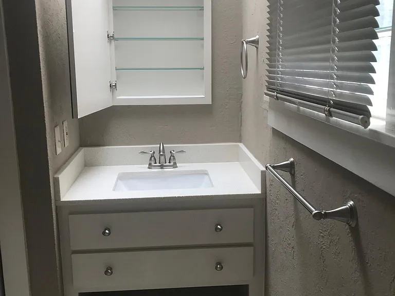 Bath #1 vanity with storage and medicine cabinet